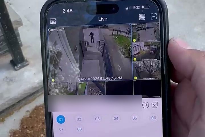 Live camera feeds from a property, viewed on a phone app